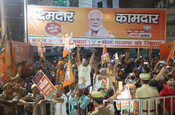 KANPUR, MAY 4 (UNI):- BJP supporters gather for Prime Minister Narendra Modi's road show for Lok Sabha elections, in Kanpur on Saturday. UNI PHOTO-110U